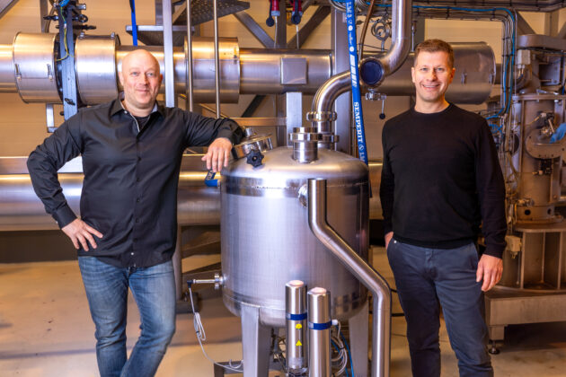 Operations Manager Hans Richard Nyheim and Process Operator Aleksander Holmen inside the Biotep mini factory.